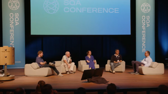 Panellists in discussion during the Ask Me Anything session. From right to left: Frank Wilhelm-Mauch, Alessandro Bruno, Anne-Marije Zwerver, and David DiVincenzo <br> © SQA Conference I Screenshot from Superconducting Qubits and Algorithms (SQA) Conference 2025 - Day 1, Youtube
